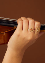 Load image into Gallery viewer, House and little boat shaped gold rings on woman's hand