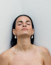 Load image into Gallery viewer, Model wearing gold earrings with fresh water baroque pearls