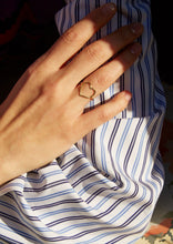 Load image into Gallery viewer, Heart shaped gold ring worn by model