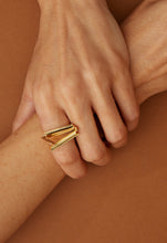 Load image into Gallery viewer, Gold ring with triangular cut citrine stone on woman's hand