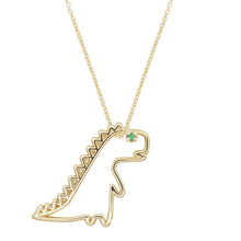 Load image into Gallery viewer, Gold chain necklace with dinosaur shaped pendant and small emerald