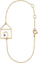 Load image into Gallery viewer, Gold chain bracelet with house shaped pendant and small blue sapphire