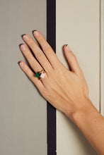 Load image into Gallery viewer, Hand wearing two gold rings with cylinder cut pink opal and malachite stones