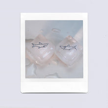 Load image into Gallery viewer, White gold shark shaped pendants on ice cubes
