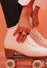 Load image into Gallery viewer, Woman wearing gold rings with rhombus cut stones
